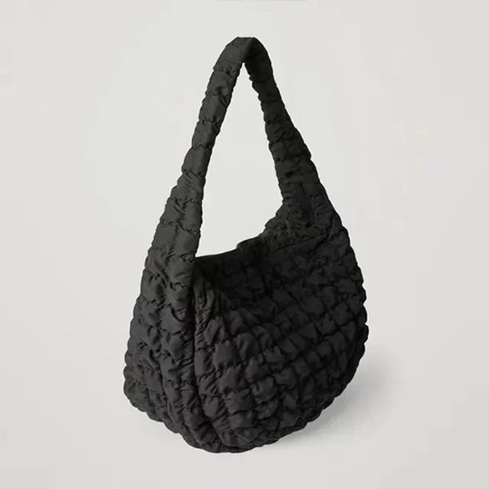 Daunen-Schultertasche – Perfekt für Ihre Reisen!