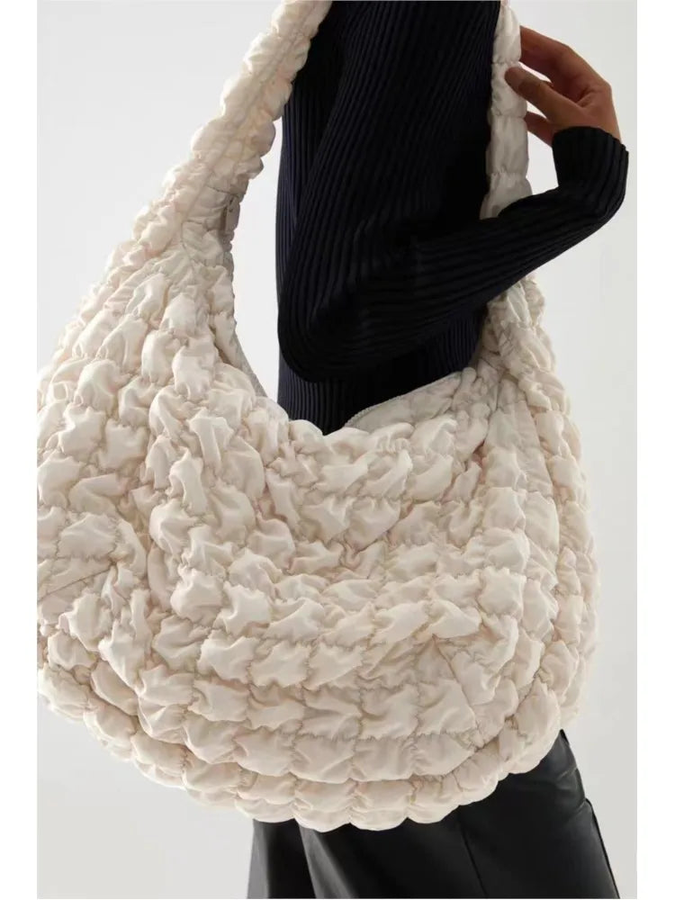 Daunen-Schultertasche – Perfekt für Ihre Reisen!